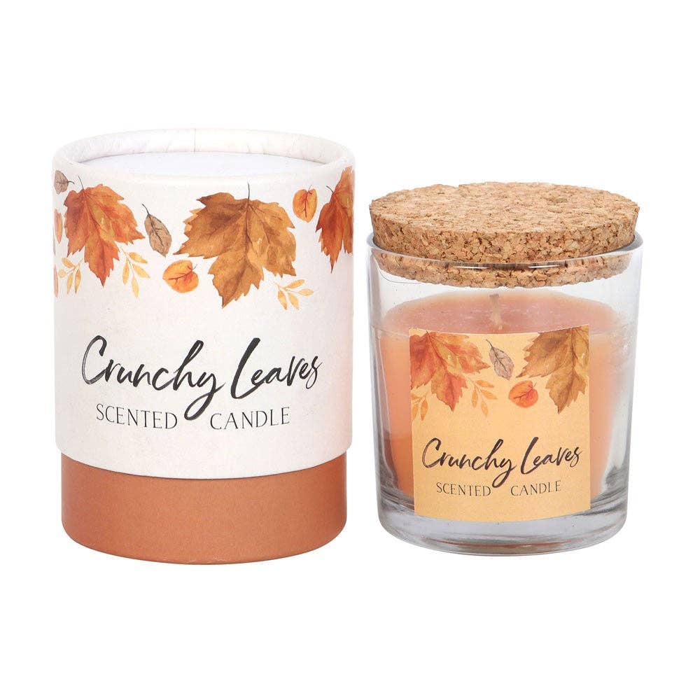 Vela de otoño con hojas crujientes