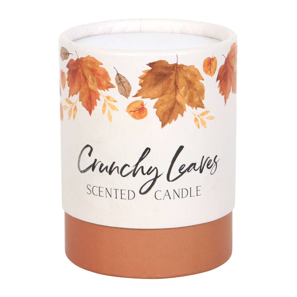 Vela de otoño con hojas crujientes