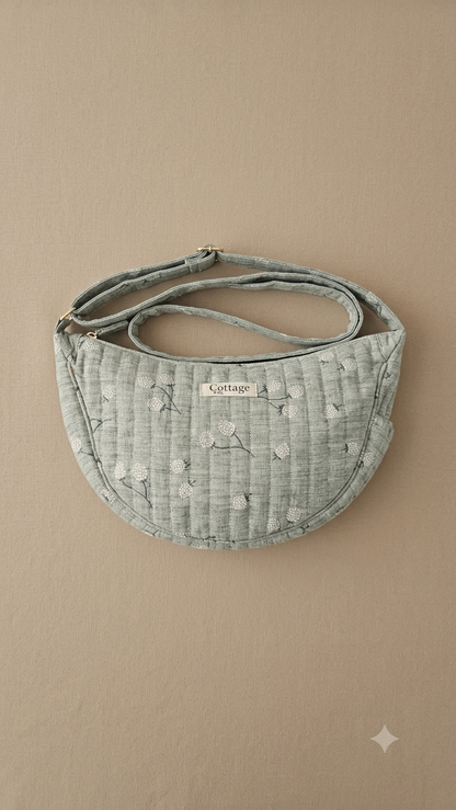 Bolso luna de algodón para llevar cruzado acolchado