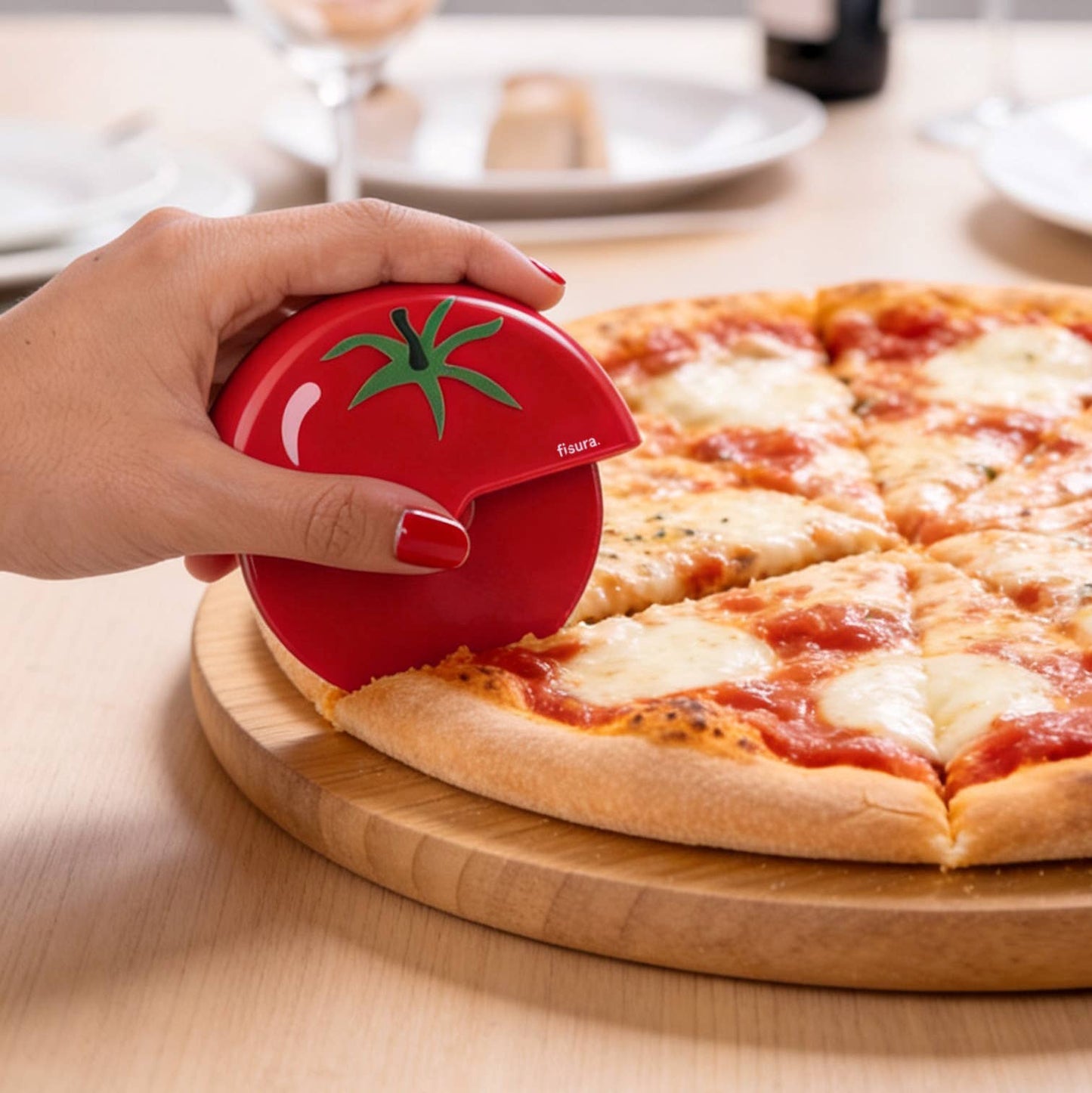Corta pizza tomate