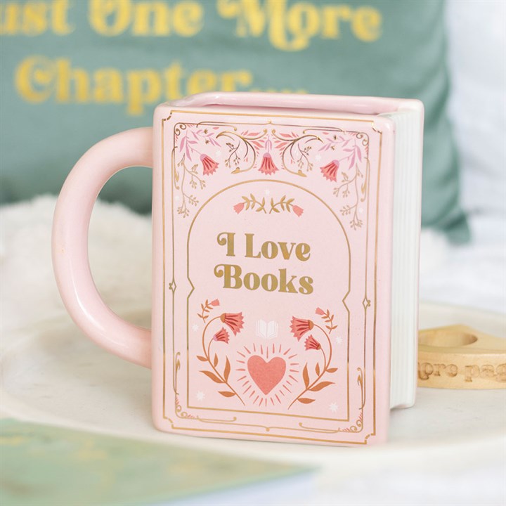 Taza rosa con forma de libro "Me encantan los libros"