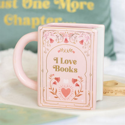 Taza rosa con forma de libro "Me encantan los libros"