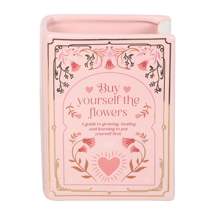 Jarrón rosa con forma de libro