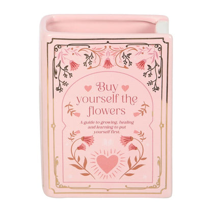 Jarrón rosa con forma de libro