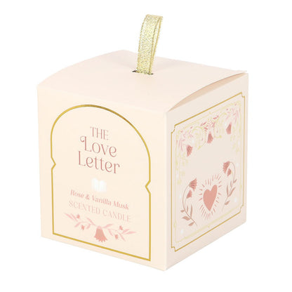 Vela aromática Love Letter de rosa, vainilla y almizcle con tapa dorada