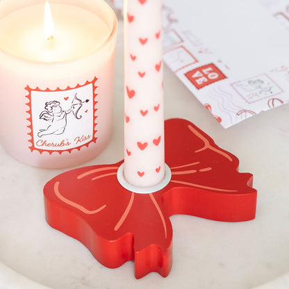 Candelabro cónico decorativo con lazo rojo