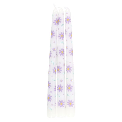 Juego de 3 velas cónicas con margaritas moradas