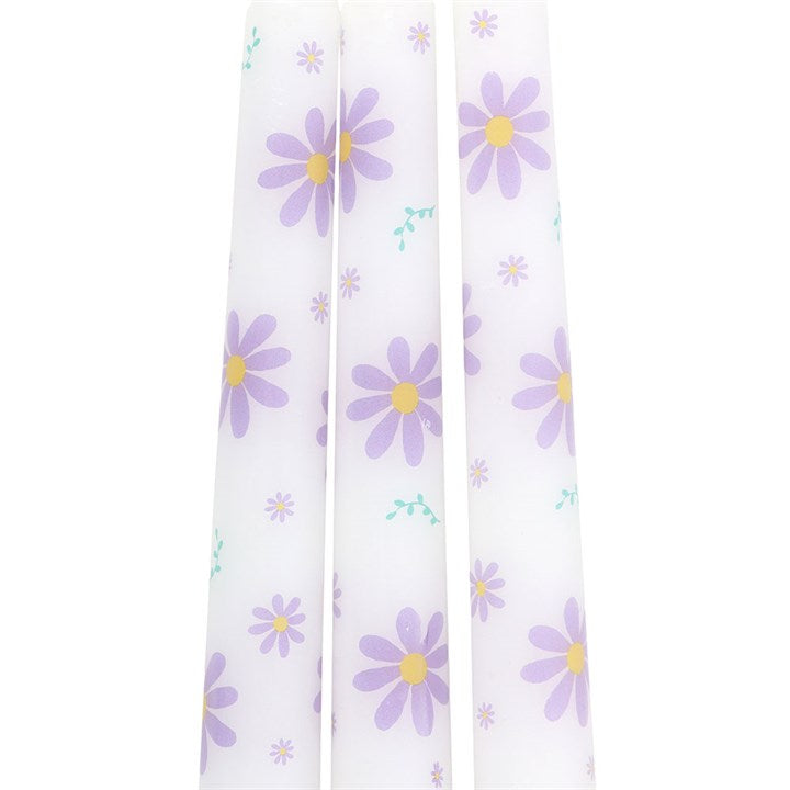 Juego de 3 velas cónicas con margaritas moradas