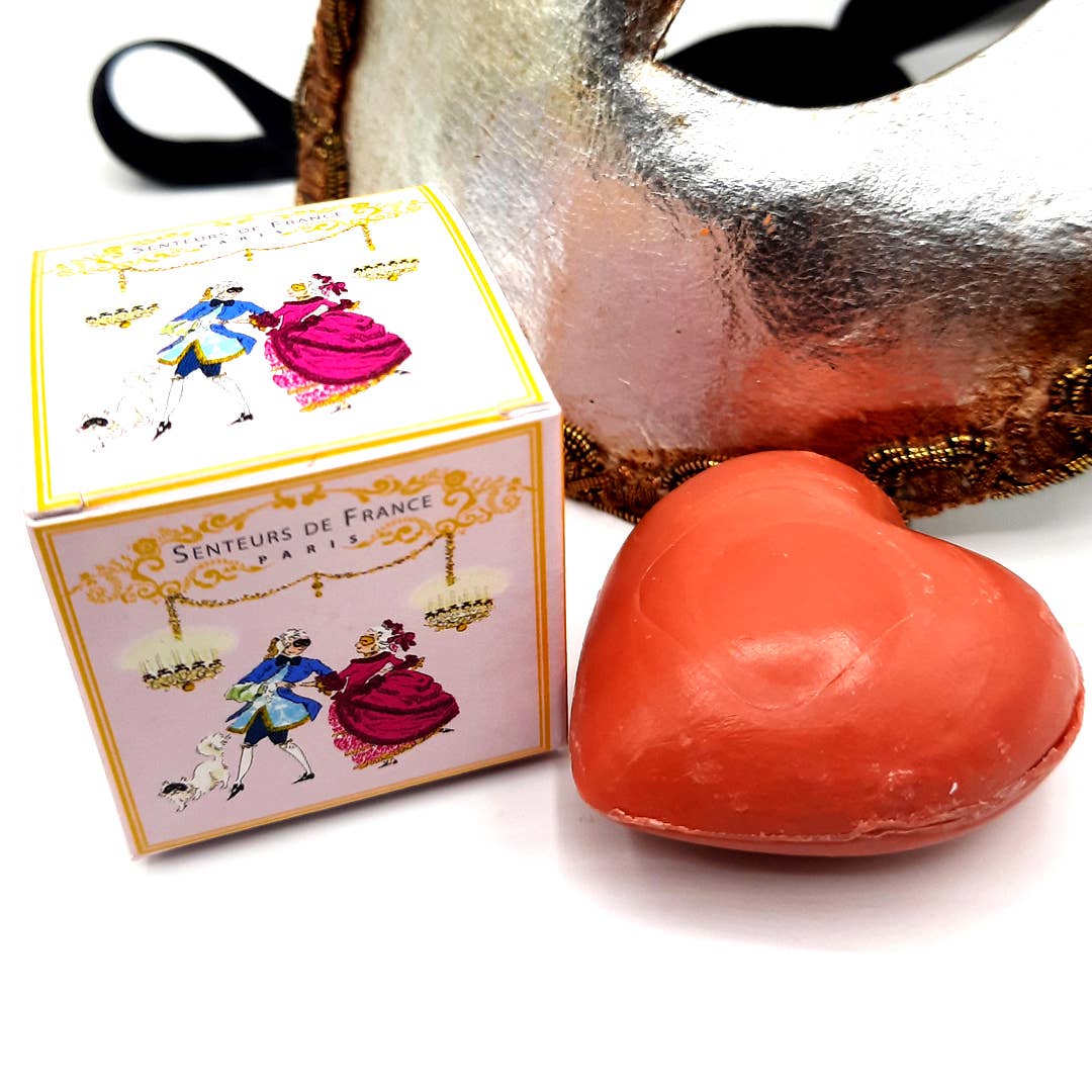 Jabón en forma de corazón con aroma a frutas rojas y caja ilustrada con baile de máscaras real